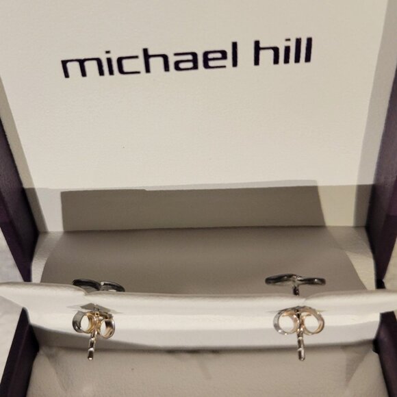 Diamond Accent Infinity Earrings in Sterling Silver - Picture 2 of 2